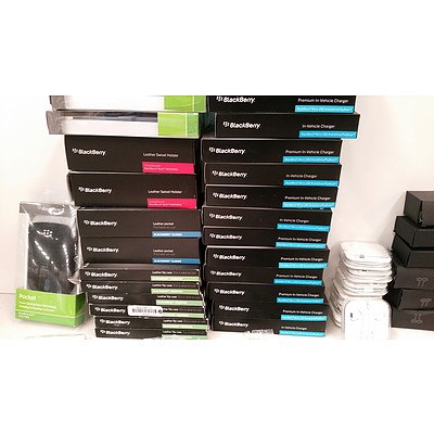 Large Lot of Assorted Phone Accessories including: Apple Earpods, Car USB Chargers, more earphones and Assorted Blackberry Cases and Screen Protectors