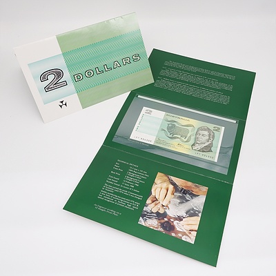 Two Consecutively Numbered $2 Johnston/Fraser Paper Notes with Folders, LPT934300 and LPT934301