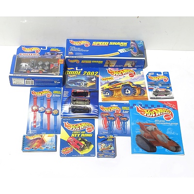 A Quantity of Hot Wheels Merchandise, Including HW Guides, HW Watches, HW Colouring Book and More