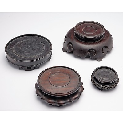 Four Chinese Carved Hardwood Vase Stands