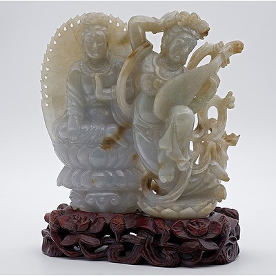 Fine Chinese Celadon and Russet Jade Figural Group of a Goddess Playing the Lute Flanked by a Bodhisattva Seated on a Lotus Base, 20th Century