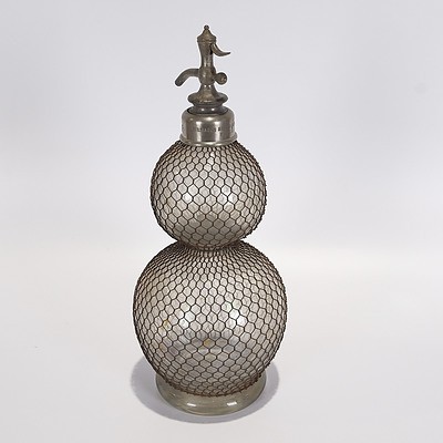 French Double-Ball Soda Syphon with Metal Wire Mesh Circa 1910. Imprinted 'Veritable Seltzogene D Fevre 5 Signed D Fevre Marque Deposee'