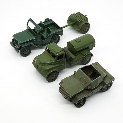 Four Vintage English Dinky Toys, 673 Scout Car, 643 Army Water Tanker, Jeep 25Y and Trailer 25 Pr Gun