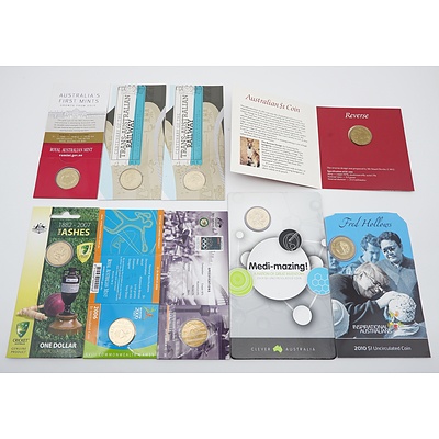 Nine RAM Uncirculated One Dollar Coins, Including 2007 The Ashes, 2000 XXVII Olympiad, 2006 Melbourne Commonwealth Games and More