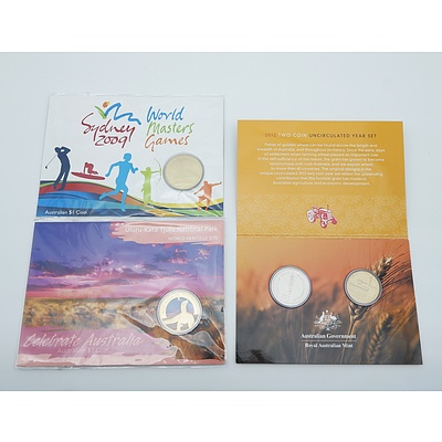 Three Uncirculated Coin Sets, Including 2012 Wheat - Fields of Gold, 2009 World Sydney Masters, and 2012 Celebrate Australia