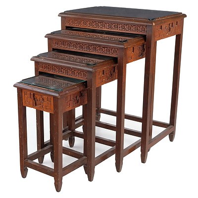 Set of Four Carved Chinese Teak and Glass Top Nesting Tables