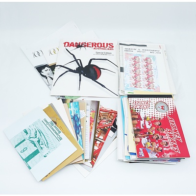 Large Group of Australian Stamp Packs Including XII Commonwealth Games Brisbane 1982, Famous Australian Aviators, Queen's Birthday Sheetlet and More