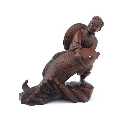 Chinese Hardwood Carving of A Fisherman and Carp with Inlaid Eyes