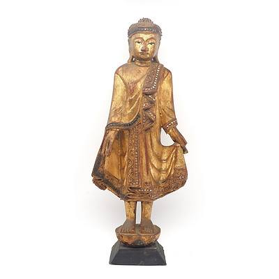 Burmese Carved and Lacquered Wood Figure of Buddha with Inlaid Glass Ornaments, 20th Century