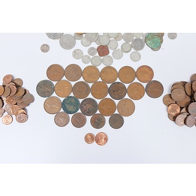 Assorted Coins including: Australian Pennies, Half Pennies, One and Two Cent coins, and various other currencies