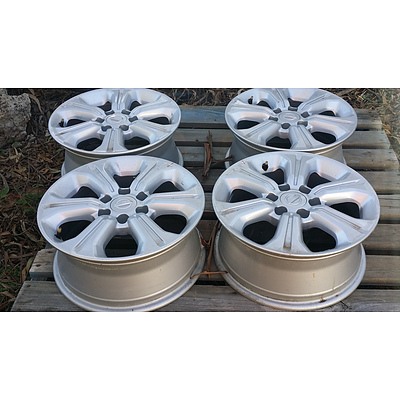 Lot 133 - Nissan Navara 16x7 Alloy Wheels - Set of 4