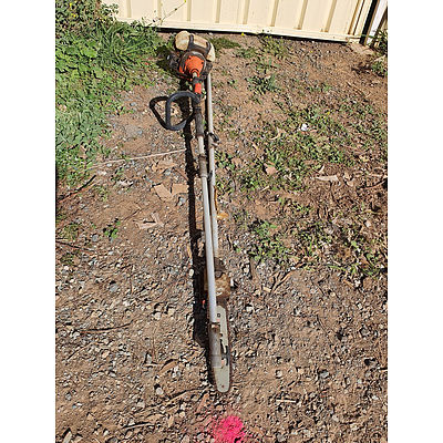 Lot 192 - Baumr AG 65cc Long Reach Multi Tool with Chainsaw Attachment