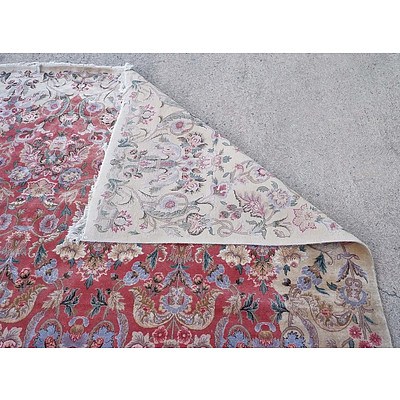 Large Persian Qum Finely Hand Knotted Wool Pile Floral Medallion Carpet with a Pinkish Red Ground