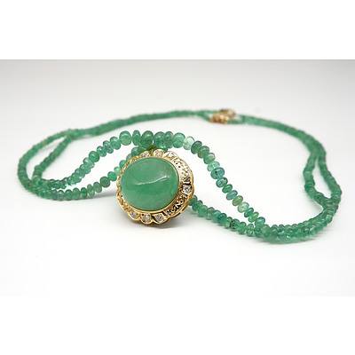 Impressive Gold and Diamond Set 50ct Emerald Cabochon Pendant on an Emerald Beaded Necklace