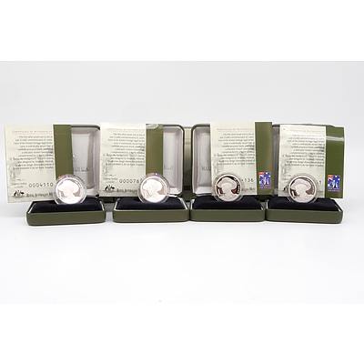 Four 1999 $1 Fine .999 Silver Proof Coins with Boxes