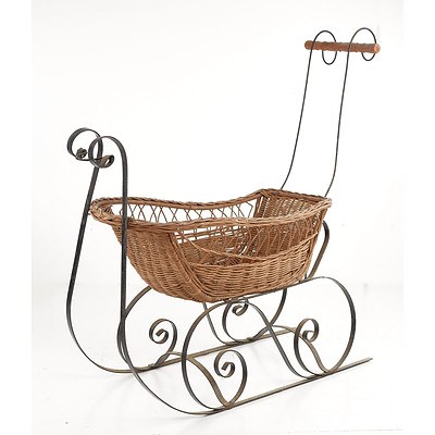Wrought Iron and Wicker Sleigh Form Bassinette, Later 20th Century
