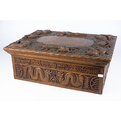 South Chinese or Burmese Teak Writing Box Profusely Carved with Dragons and Auspicious Symbols, Circa 1900