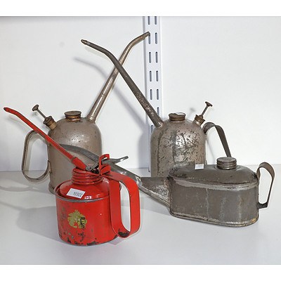 Three Pump Action Oil Cans and Another