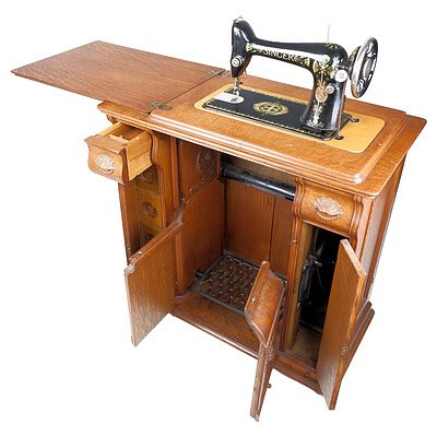 Vintage Singer Treadle Sewing Machine In Decorative Oak Cabinet