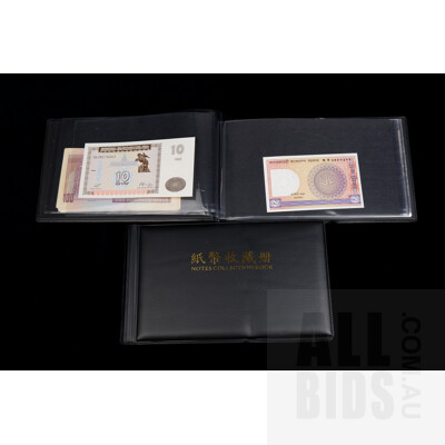 Two Banknote Books with International Banknotes From: Brazil, Peru, China and More