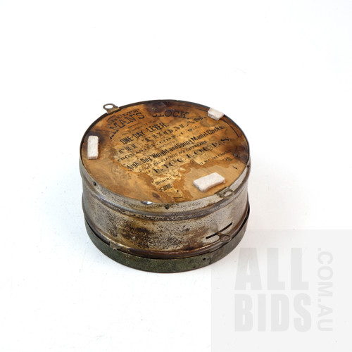 American Seth Thomas Ships Clock with Exposed Escapement and partial Advertisement Verso