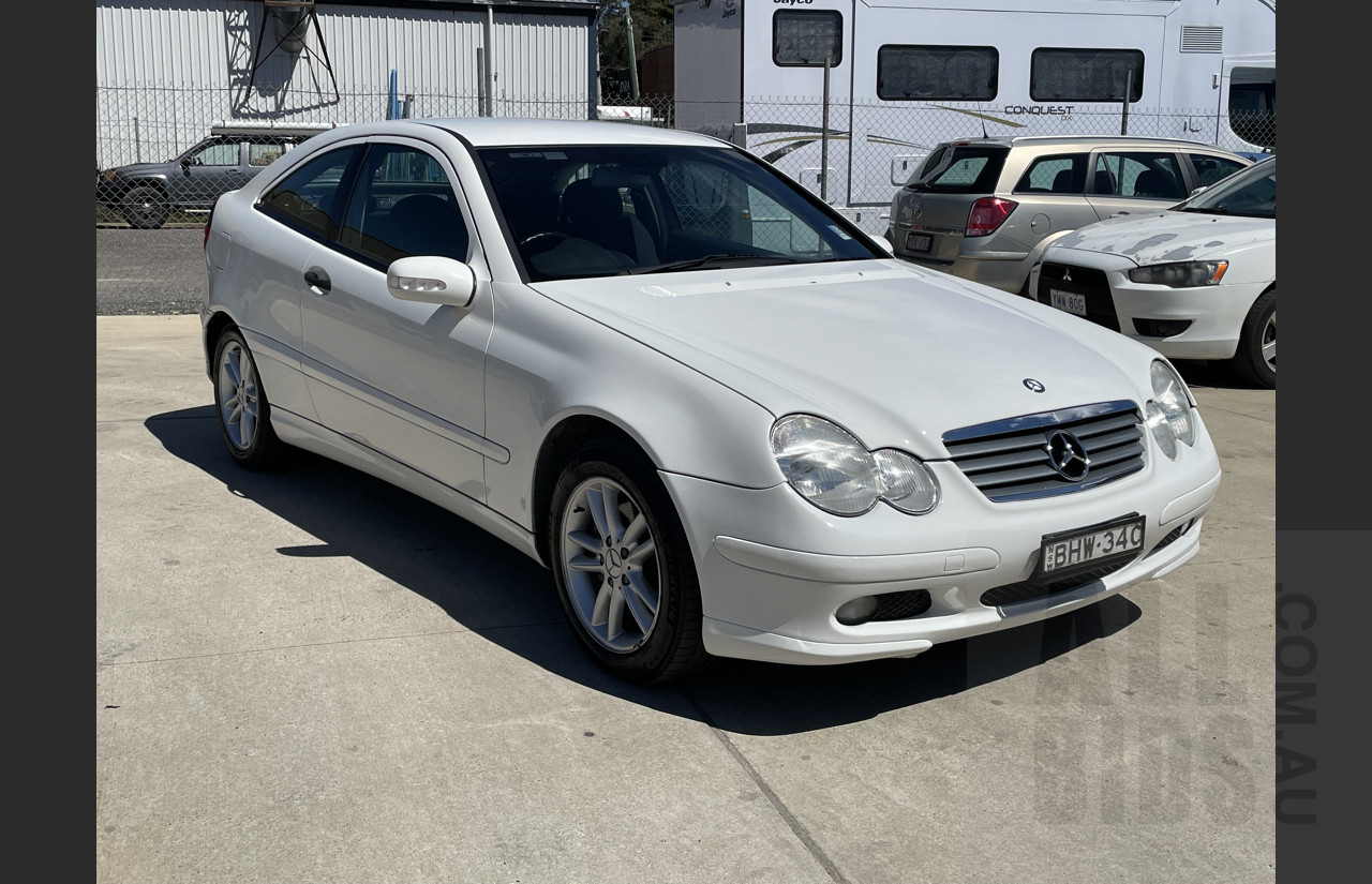 8/2002 Mercedes-Benz C180 Kompressor CL203 2d Coupe White 1.8L