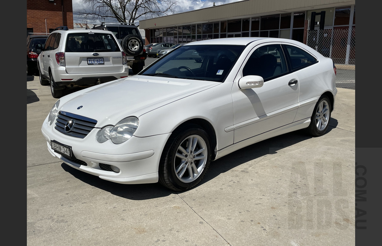 8/2002 Mercedes-Benz C180 Kompressor CL203 2d Coupe White 1.8L