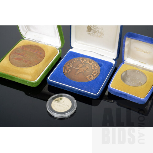 Canberra Justice of the Peace 30 Year Medallion, HMAS Canberra Medallion and Royal Australia Mint Canberra Medallion (4)