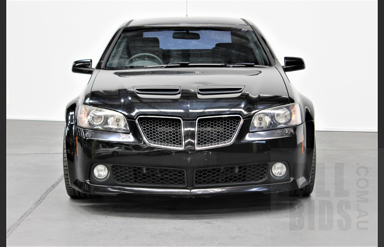 2/2010 Holden Commodore SS-V VE MY10 4d Sedan Black V8 Supercharged