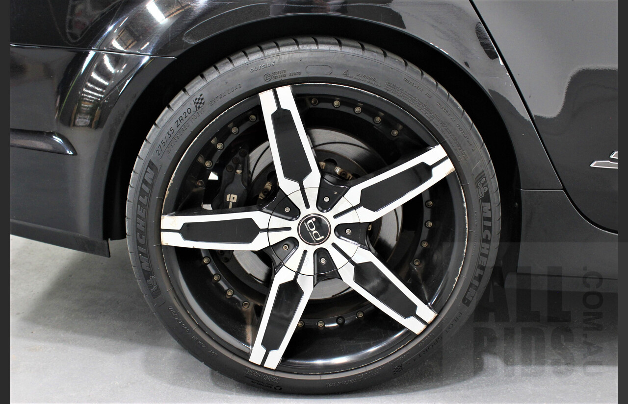 2/2010 Holden Commodore SS-V VE MY10 4d Sedan Black V8 Supercharged
