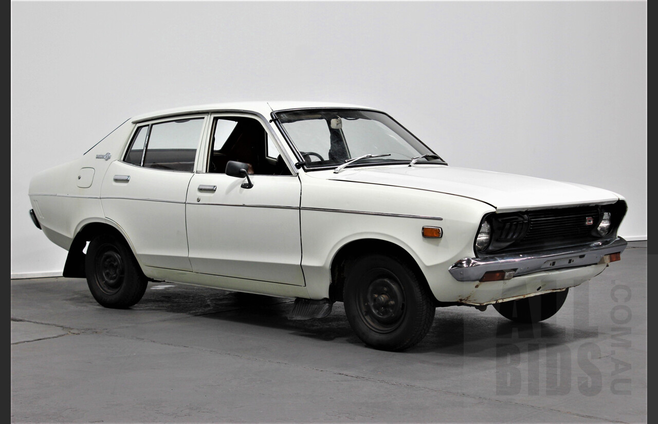 7/1974 Datsun 120y 4d Sedan White 1.2L