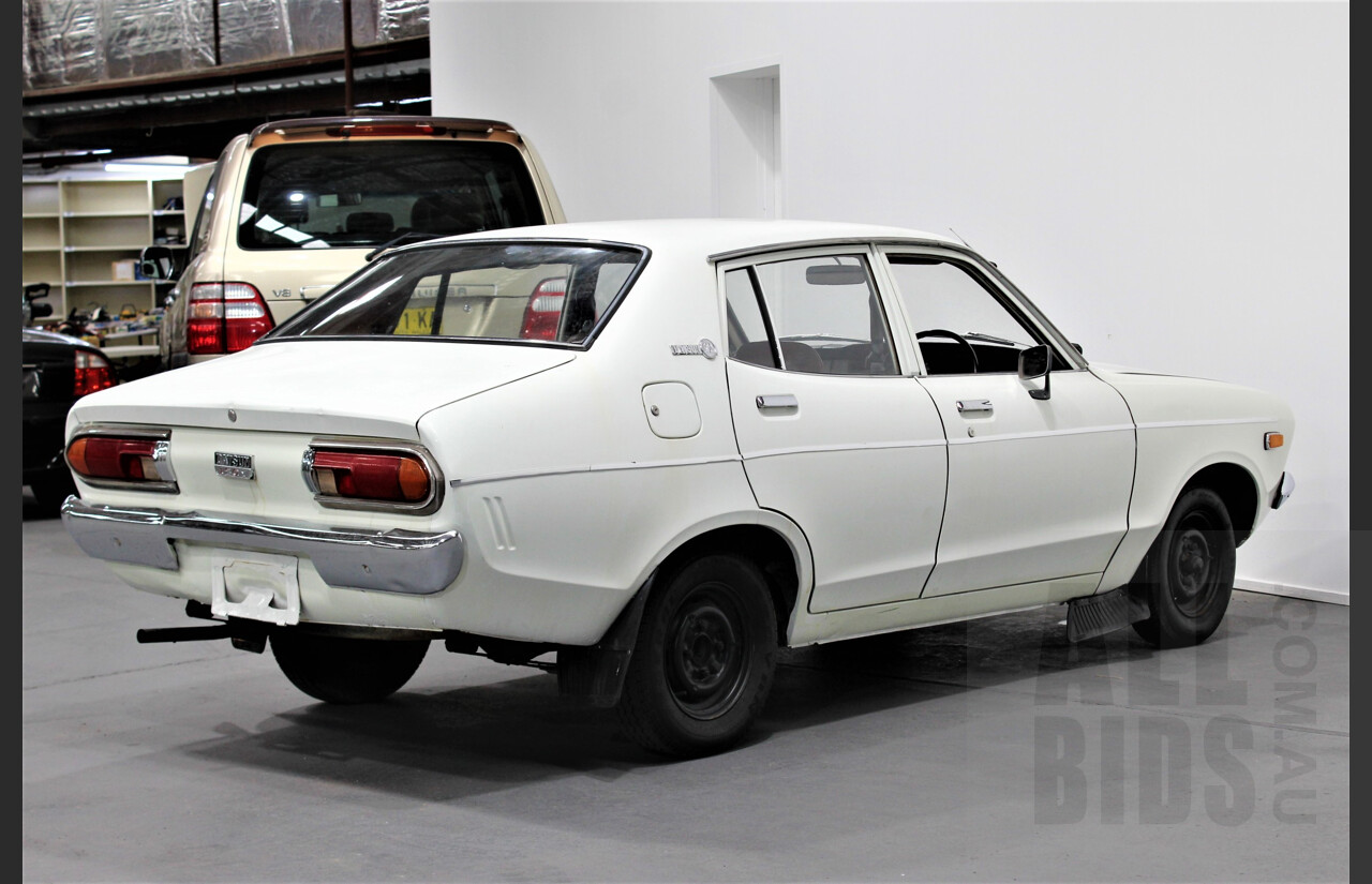 7/1974 Datsun 120y 4d Sedan White 1.2L