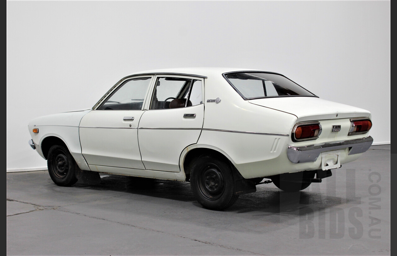 7/1974 Datsun 120y 4d Sedan White 1.2L