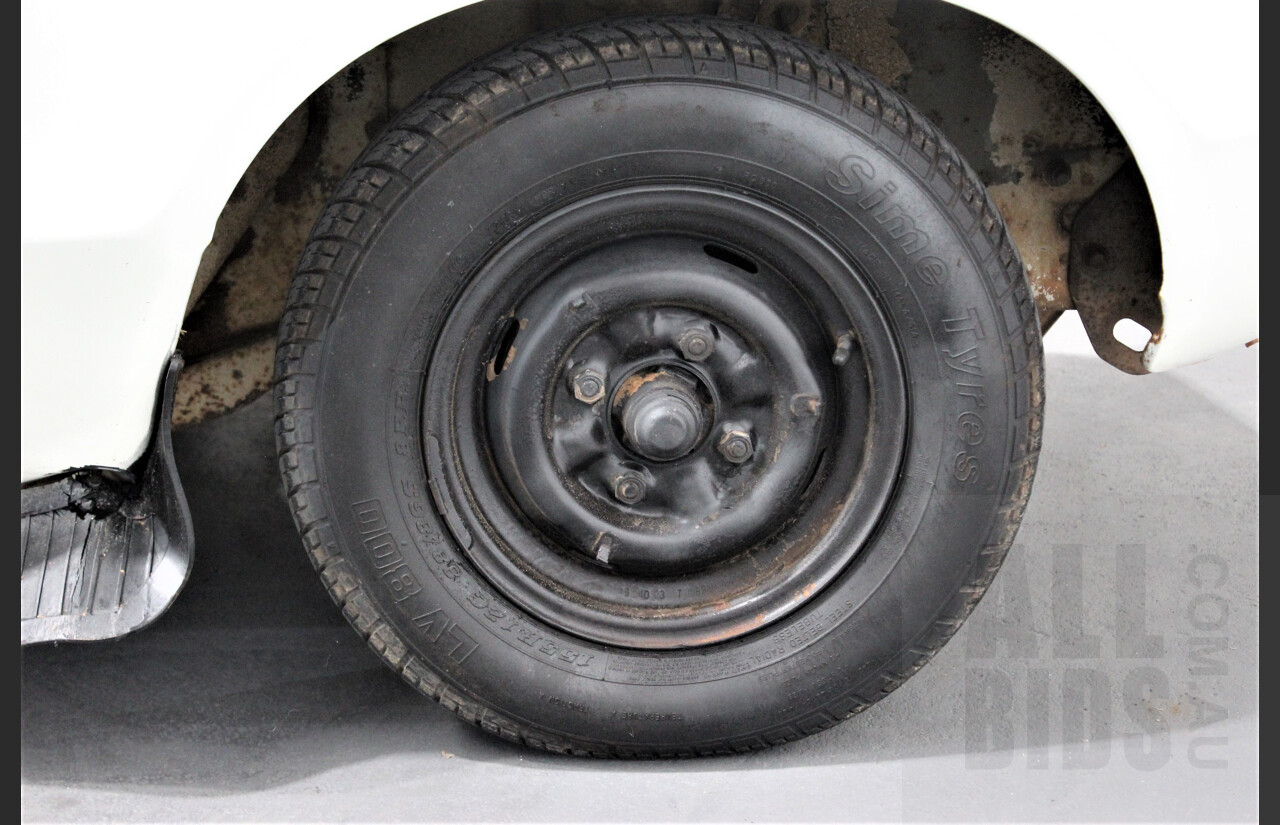 7/1974 Datsun 120y 4d Sedan White 1.2L