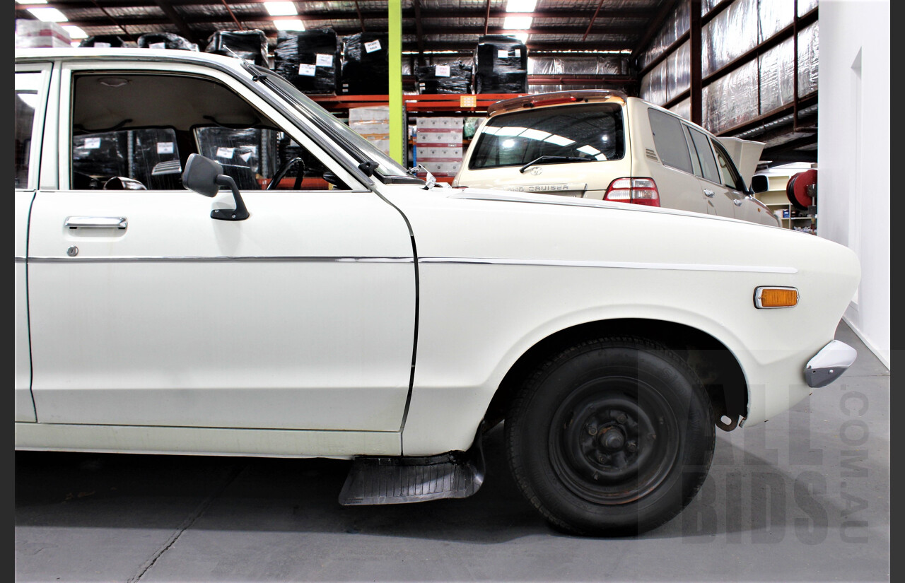 7/1974 Datsun 120y 4d Sedan White 1.2L