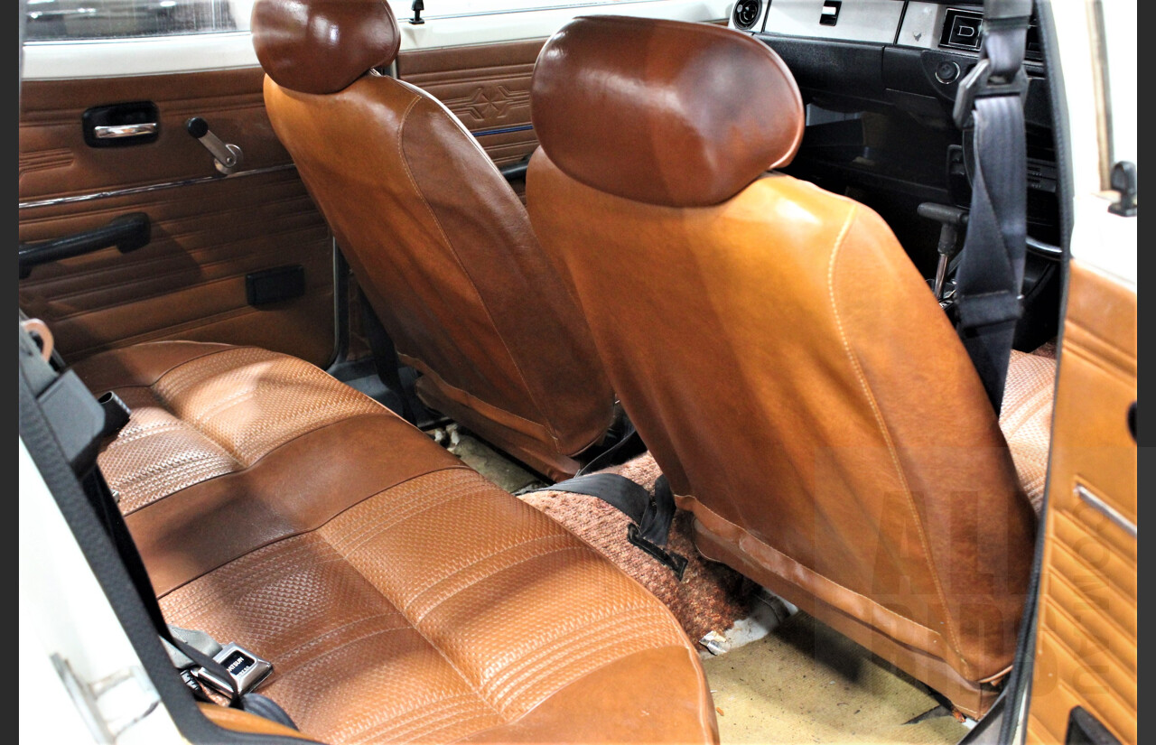 7/1974 Datsun 120y 4d Sedan White 1.2L