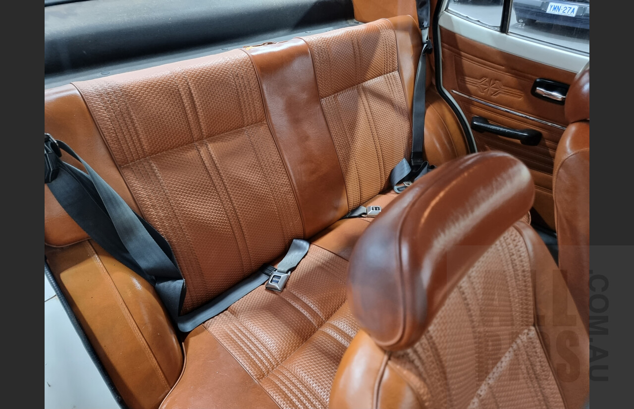 7/1974 Datsun 120y 4d Sedan White 1.2L