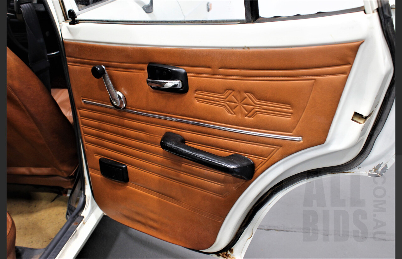 7/1974 Datsun 120y 4d Sedan White 1.2L