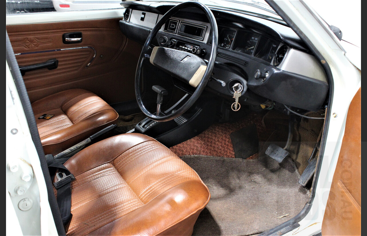 7/1974 Datsun 120y 4d Sedan White 1.2L