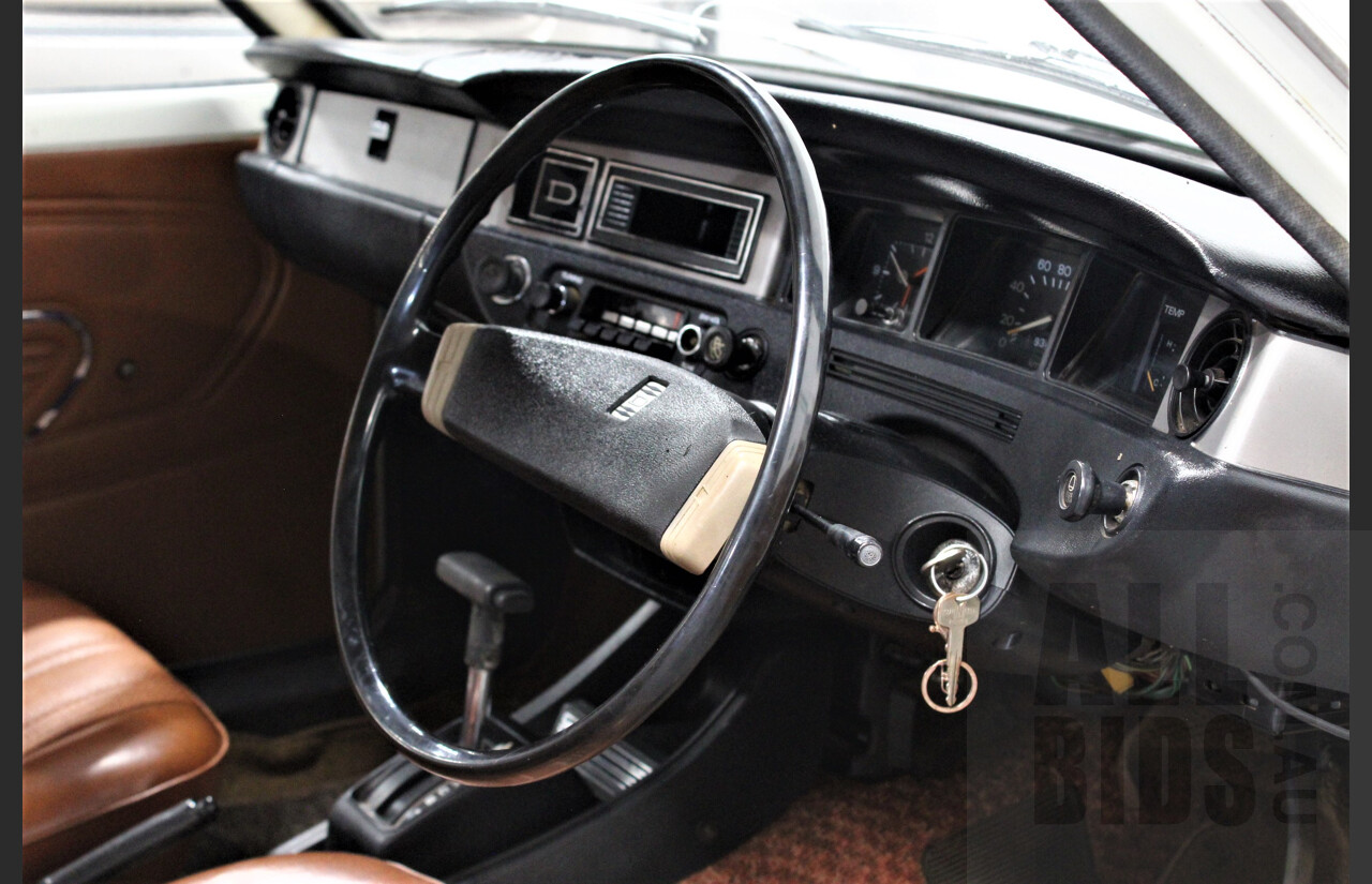 7/1974 Datsun 120y 4d Sedan White 1.2L