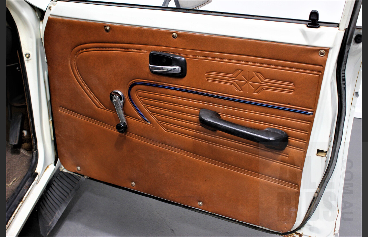 7/1974 Datsun 120y 4d Sedan White 1.2L