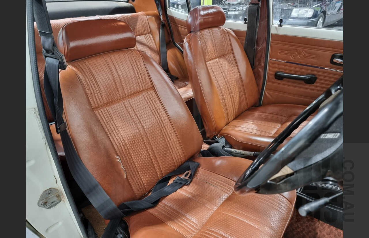 7/1974 Datsun 120y 4d Sedan White 1.2L