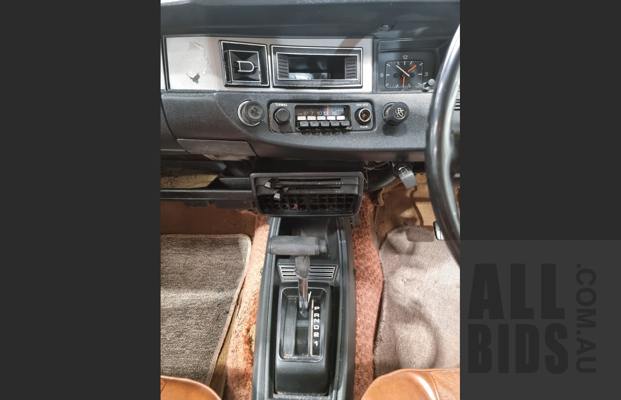 7/1974 Datsun 120y 4d Sedan White 1.2L