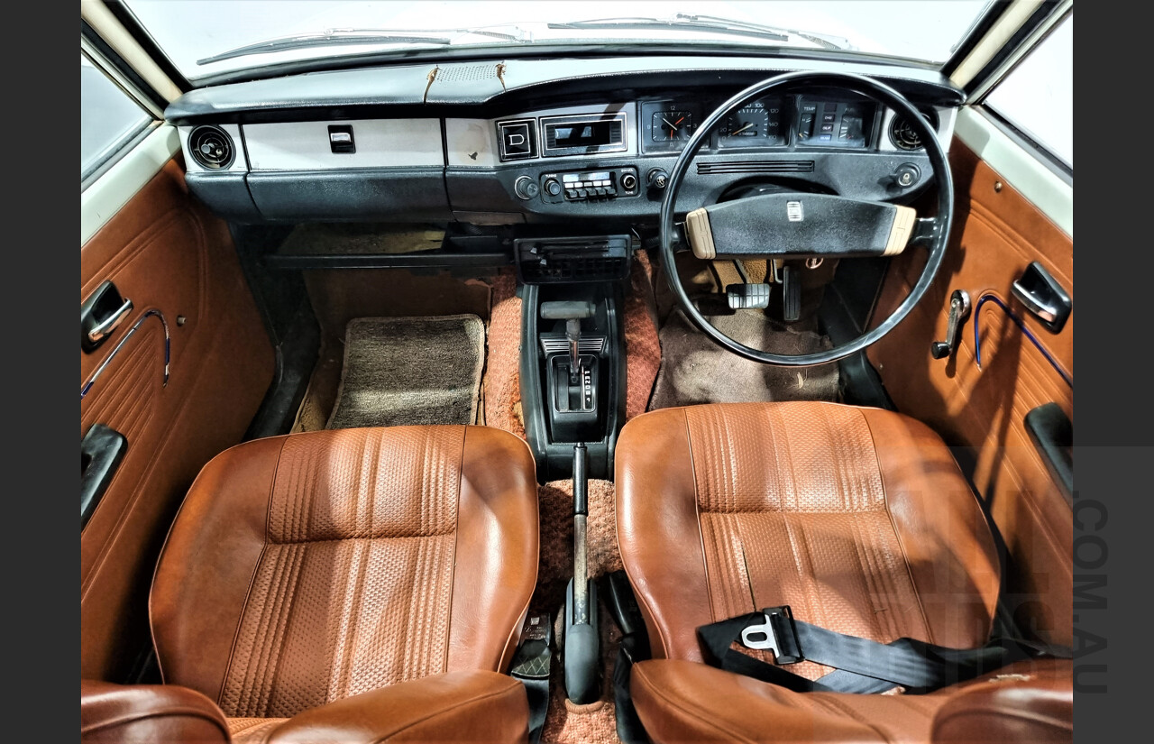 7/1974 Datsun 120y 4d Sedan White 1.2L