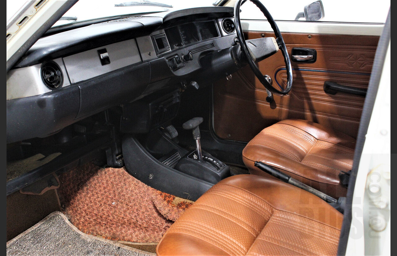 7/1974 Datsun 120y 4d Sedan White 1.2L