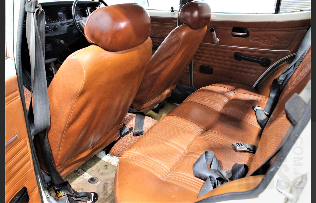 7/1974 Datsun 120y 4d Sedan White 1.2L