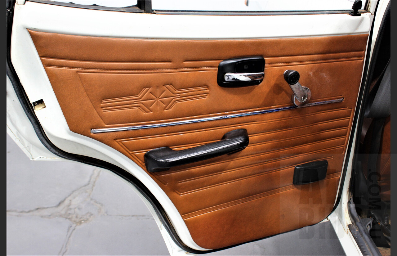 7/1974 Datsun 120y 4d Sedan White 1.2L