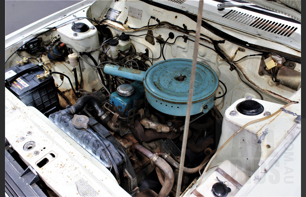 7/1974 Datsun 120y 4d Sedan White 1.2L