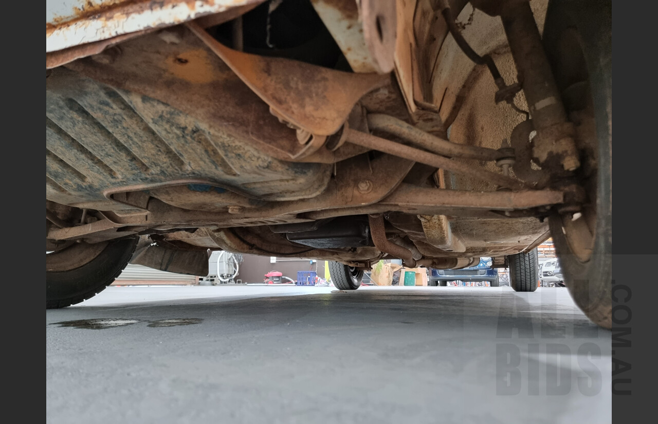 7/1974 Datsun 120y 4d Sedan White 1.2L