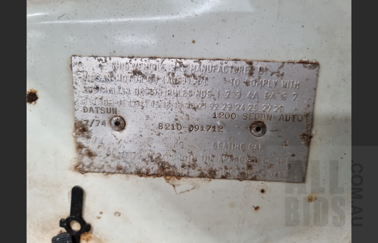 7/1974 Datsun 120y 4d Sedan White 1.2L